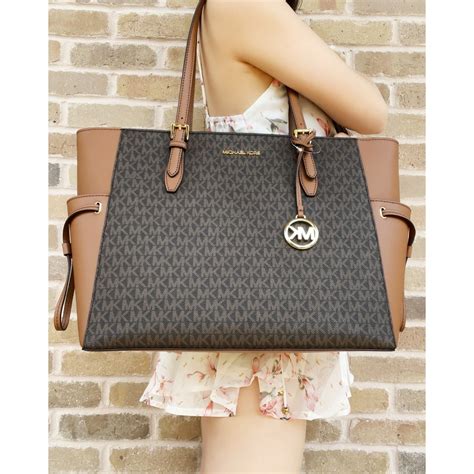 prezzo michael michael kors shopping large jet set travel|michael kors tote bag.